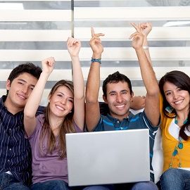 Excited group with a laptop